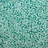 Mousseline imprimée crinkle lurex sérendipité fond turquoise