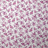 Piqué de coton imprimé les fleurs de Louna violet fond blanc