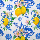 Polycoton imprimé citron et fleurs fond blanc