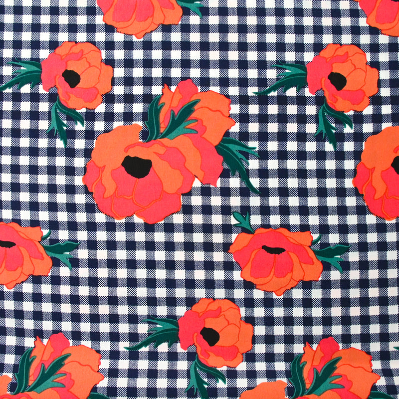 Polyester imprimé à carreaux marine fleurs orange