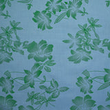 Polyester imprimé fantaisie fleurs vertes fond bleu ciel