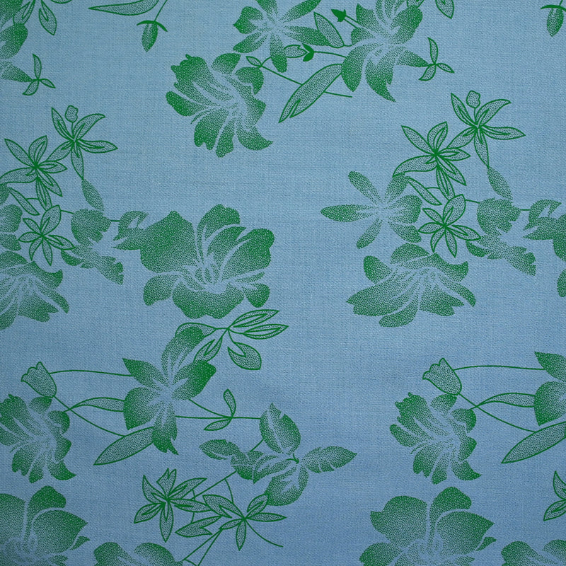 Polyester imprimé fantaisie fleurs vertes fond bleu ciel