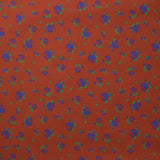 Polyviscose imprimée fleurs bleues fond brique