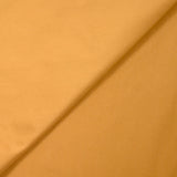 Popeline de coton ocre