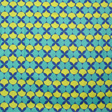 Popeline enduite imprimée pois & trèfle citron fond marine