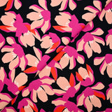 Satin de coton élasthanne fleurs rose fond bleu marine