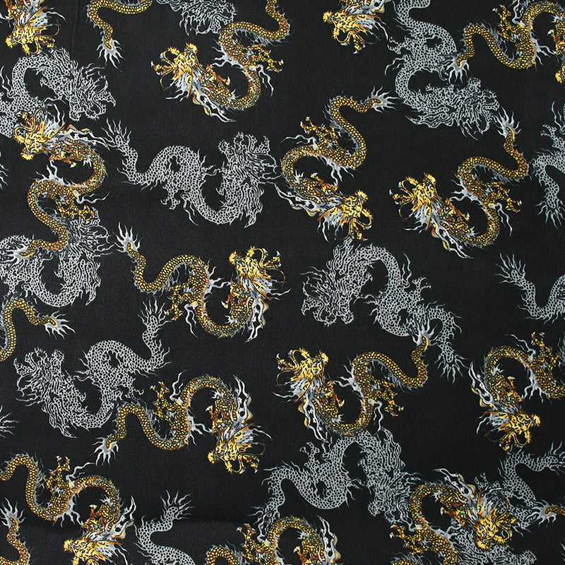 Satin de polyester mat imprimé serpent jaune et gris fond noir
