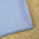 Satin de polyviscose tissé-teint rayé fond bleu ciel