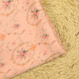 Satin polyester imprimé abstrait fond saumon