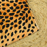 Satin polyester imprimé guépard fond camel