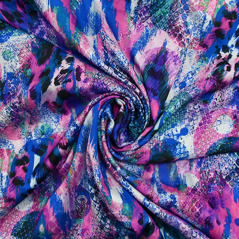 Satin de polyester imprimé peau d'animal bleu roi et magenta