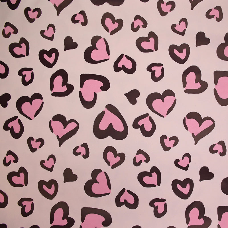 Tissu imperméable déperlant imprimé petit coeur rose