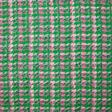 Tweed de polyester rose fond vert prairie