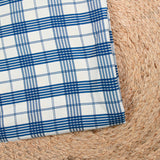 Twill de viscose à carreaux bleus fond blanc cassé