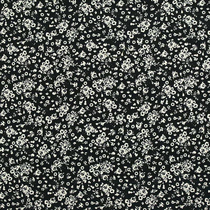 Twill de viscose imprimé champ de fleurs écru fond noir