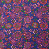 Velours de coton côtelé imprimé fleurs psychédéliques fond indigo