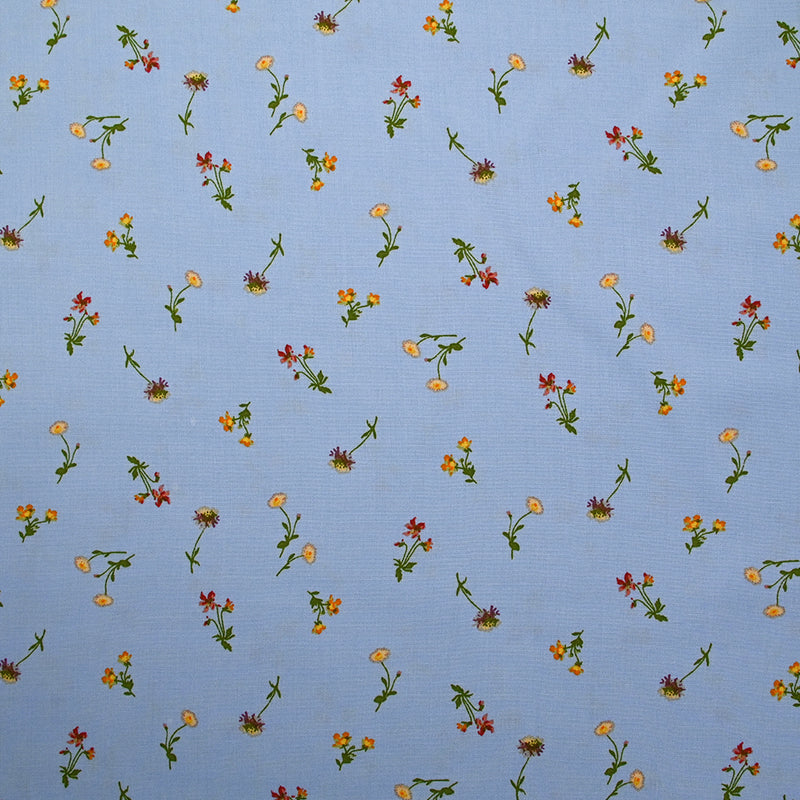 Viscose imprimée fleurette fond bleu ciel