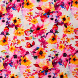 Viscose imprimée danse de fleurs jaune et rose fond blanc