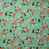 Viscose imprimée fleurs Marjolaine fond turquoise