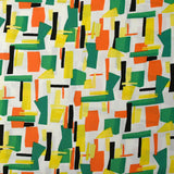 Viscose imprimée graphique orange, jaune et vert fond blanc