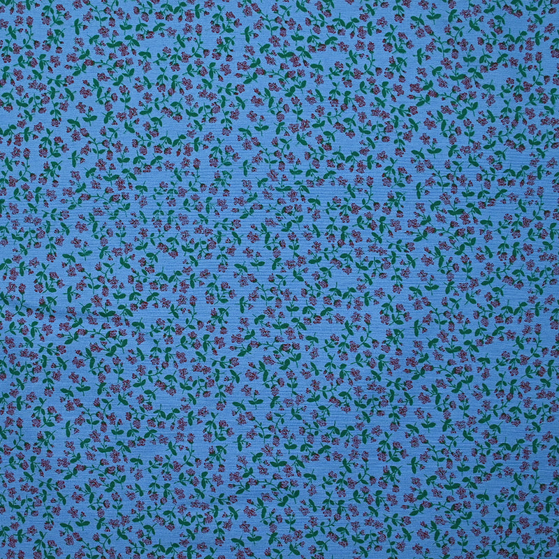 Viscose imprimée mini fleurs fond bleu