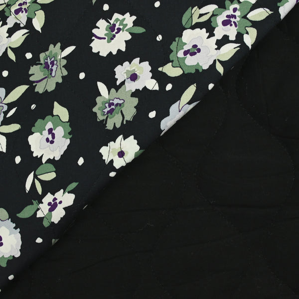 Viscose matelassée fleurs vertes fond bleu nuit envers noir