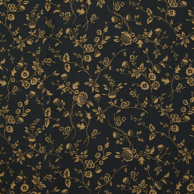 Voile de viscose imprimé branches de fleurs ocre fond noir