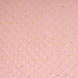 Double gaze matelassé rose pâle confettis doré vendu au mètre