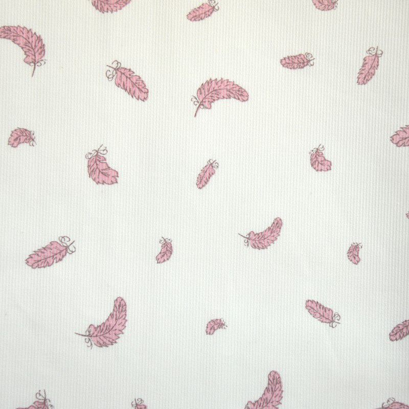 Tissus Piqué de coton imprimé plumes rose pale