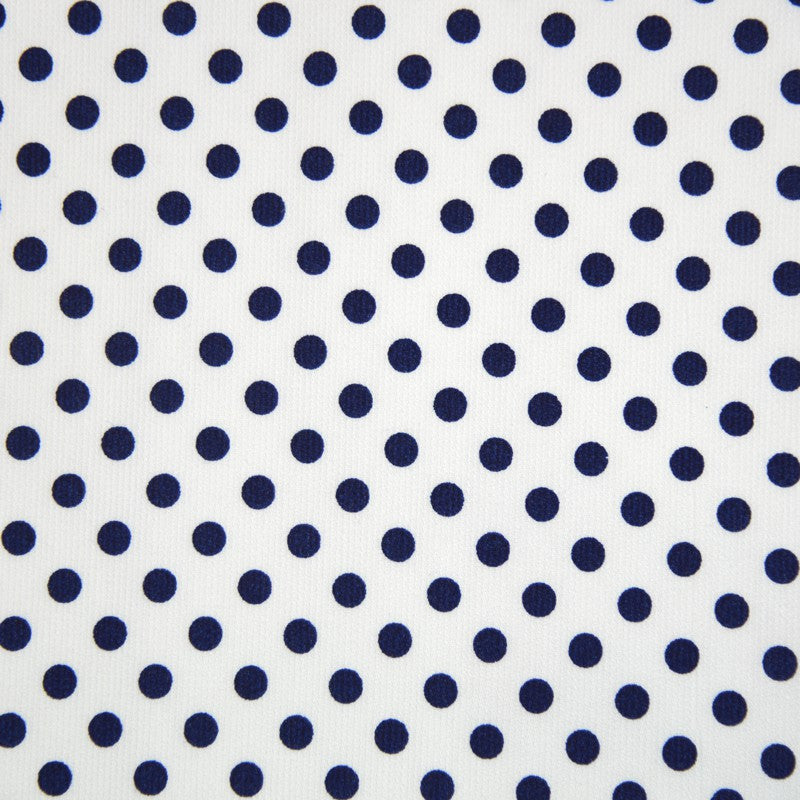 Tissus Piqué de coton milleraies imprimé pois bleu marine sur fond blanc