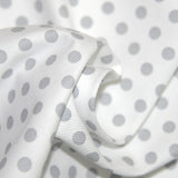 Tissus Piqué de coton milleraies imprimé pois gris sur fond blanc