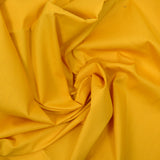 Coton uni jaune bouton d'or