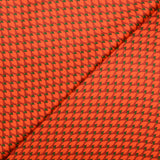 Satin de soie imprimé vive les feuilles orange fond rouge