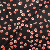 Satin de soie imprimé cellule rouge fond noir