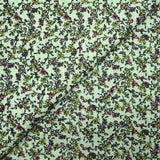 Torbellino de estampado de algodón de flores verdes