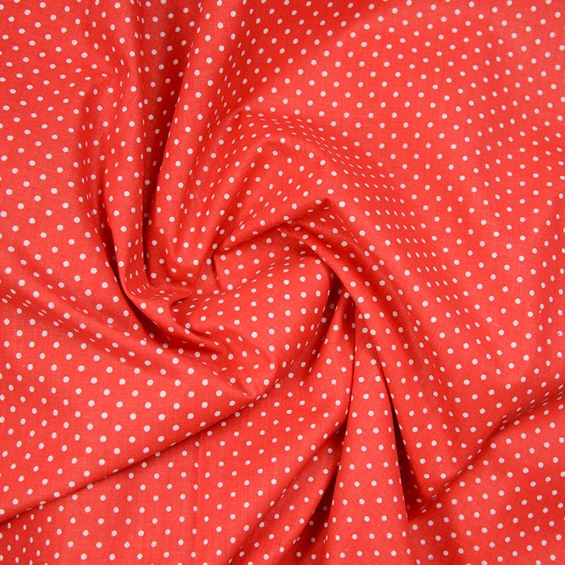 Coton imprimé petit pois blanc fond rouge