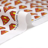 Popeline coton Justice League Superman logo fond blanc