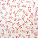 Piqué de coton imprimé poisson japonais rouge