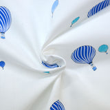 Piqué de coton imprimé montgolfière bleu