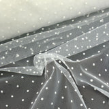 Tulle plumetis with white embroidered polka dots broken white background sold per meter