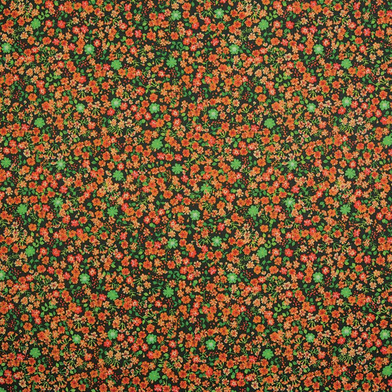 Coton imprimé perdu dans un champ de fleurs orange fond noir
