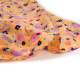 Microfibre imprimée poésie sucrée fond abricot