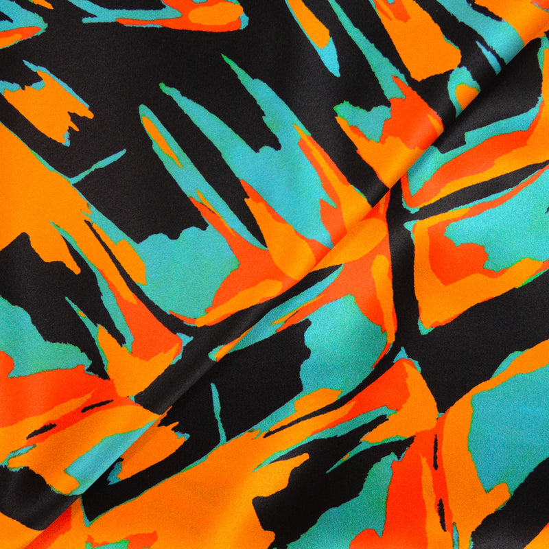 Satin de soie imprimé feu ardent orange et turquoise
