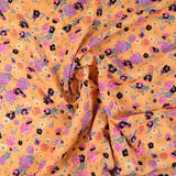 Microfibre imprimée poésie sucrée fond abricot