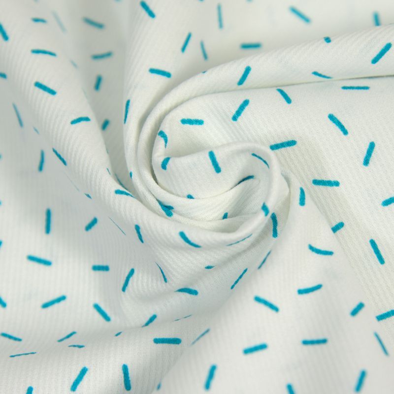 Piqué de coton imprimé feux d'artifice bleu fond blanc 45x45 cm