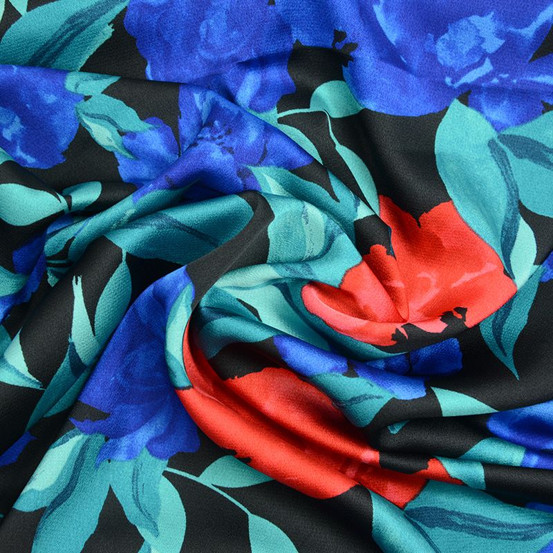 Satin polyester imprimé grandiose rouge et bleu fond noir